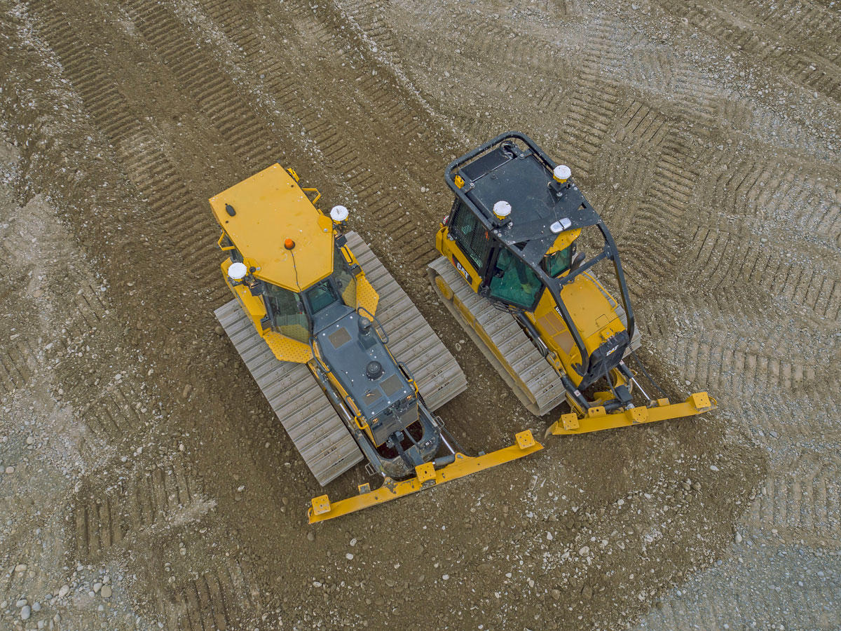 Aerial view of two dozers with machine control